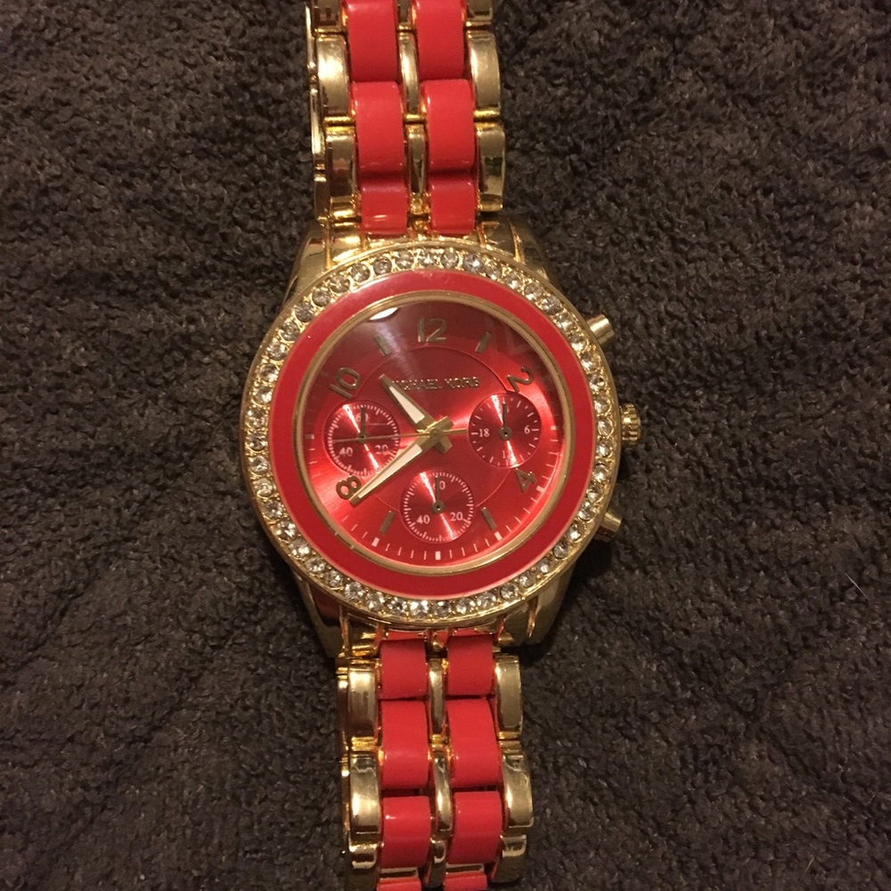 Orange and Gold MK watch with diamond accents